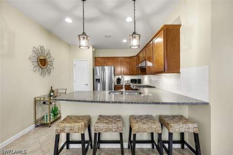 7098 Live Oak Dr, Naples FL - photo 6 of 28