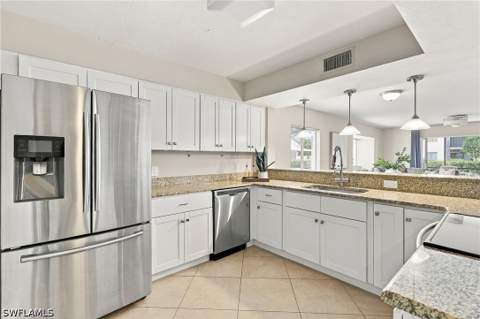 910 Vanderbilt Beach Rd 416, Naples FL - photo 16 of 43