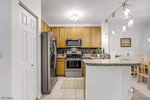 10095 Pacific Pines Ave, Fort Myers FL - photo 11 of 50