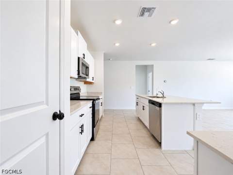 12421 Amber Waves Rd, Lehigh Acres FL - photo 12 of 43