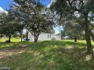 3 bedroom ManufacturedHome at 210 N Zambria St, Montura Ranch Sec 24, Clewiston — photo 2
