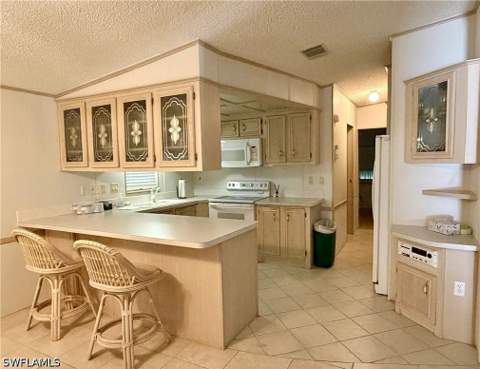 1080 Diamond Lake Cir, Naples FL - photo 7 of 19