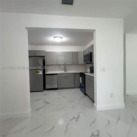 205 Seaman Ave, Opa Locka FL - photo 6 of 30