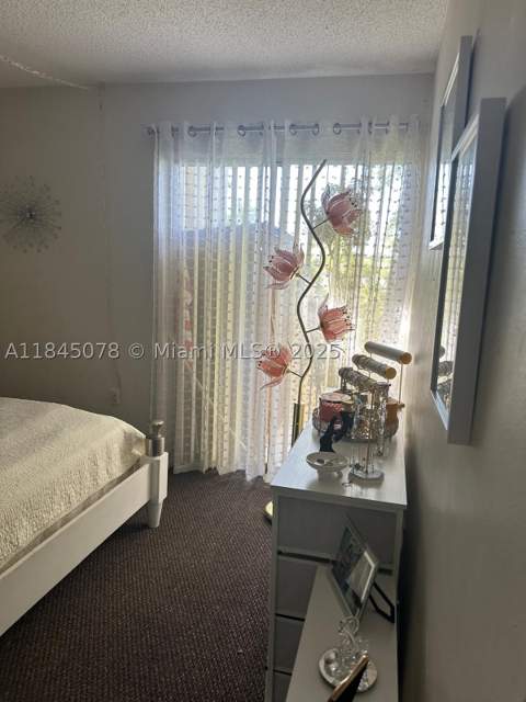 309 S Royal Poinciana Blvd 302, Miami Springs FL - photo 9 of 11