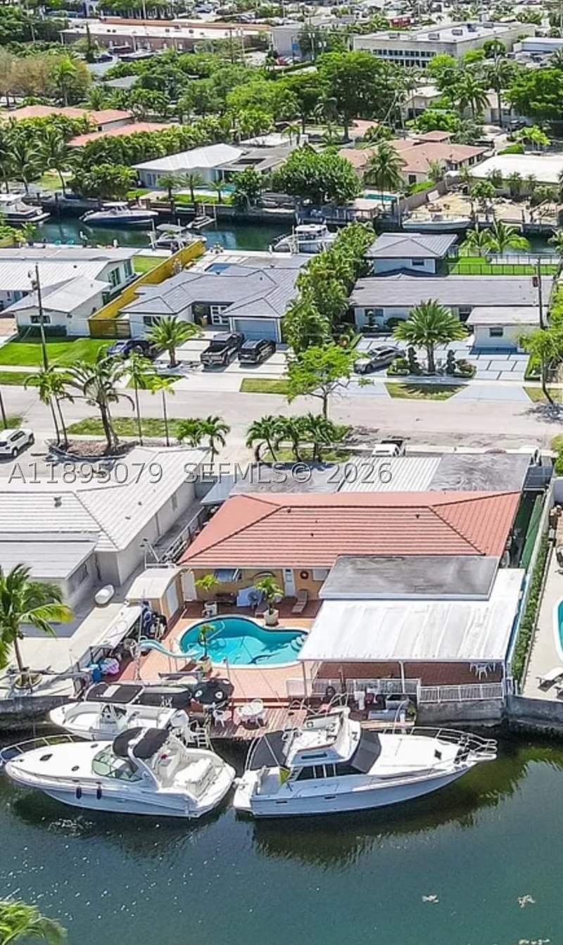 5 bedroom SingleFamilyResidence at 12941 Auralia Rd, VENETIAN SEC KEYSTONE POI, North Miami — photo 1
