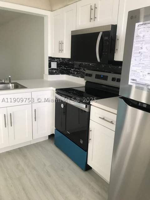 438 NE 210th Cir Ter 203-4B, Miami FL - photo 6 of 20