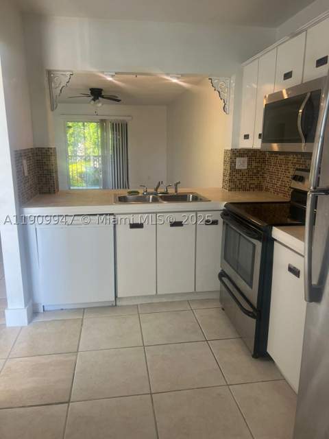 438 NE 210th Cir Ter 202-4B, Miami FL - photo 6 of 23