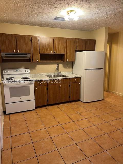 1581 NE 117 St, Miami FL - photo 8 of 29