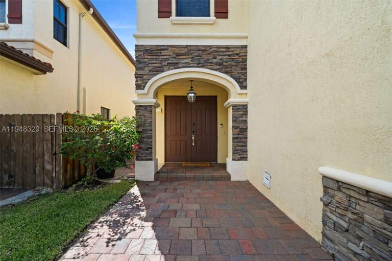 4 bedroom SingleFamilyResidence at 8658 NW 99th Path, Isles At Grand Bay, Doral — photo 2