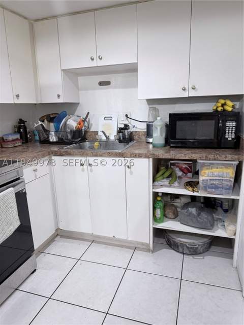 11930 NE 19th Dr 28, North Miami FL - photo 9 of 26