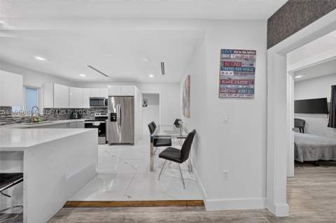 231 NW 44th St, Miami FL - photo 6 of 39