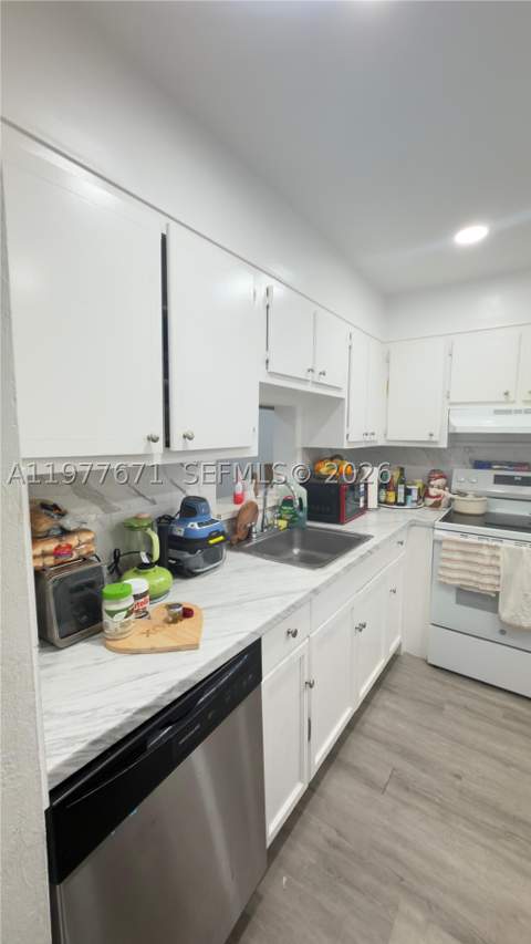 11925 NE 2nd Ave B207, North Miami FL - photo 6 of 17