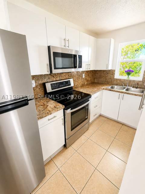 4050 NW 135th St 5-1, Opa Locka FL - photo 6 of 10