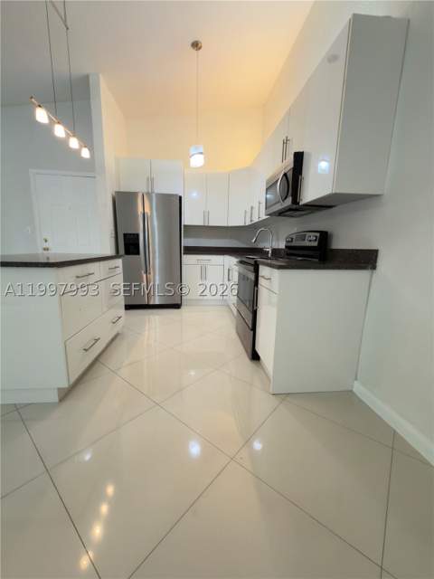 907 NE 199th St 204, Miami FL - photo 6 of 33