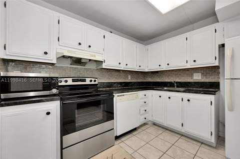 671 NE 195th St 114E, Miami FL - photo 6 of 41