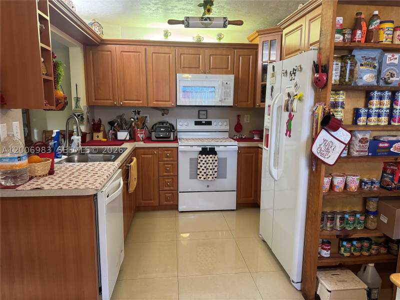 2 bedroom Condominium at 471 NE 210th Circle Ter 103, Monterey Village Two, Miami — photo 2