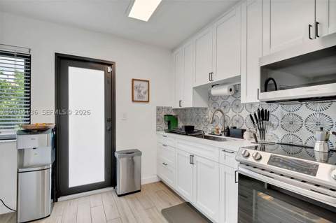 595 NW 101st St, Miami FL - photo 7 of 12