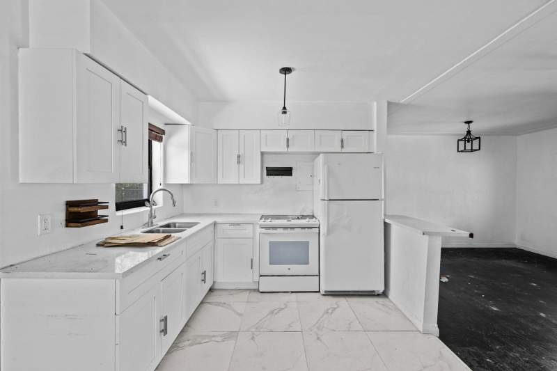 3 bedroom SingleFamilyResidence at 515 NW 88th Street, Pl Of Home Acres, El Portal — photo 2
