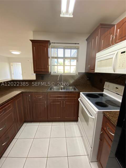 6763 NW 182nd St 105, Hialeah FL - photo 8 of 24