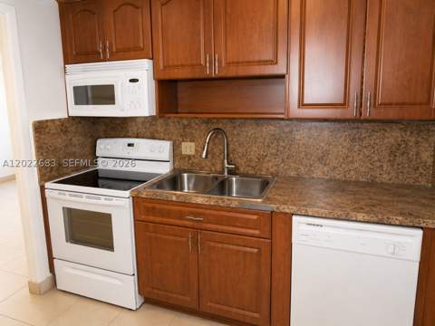 447 NE 195th St 117, Miami FL - photo 7 of 24