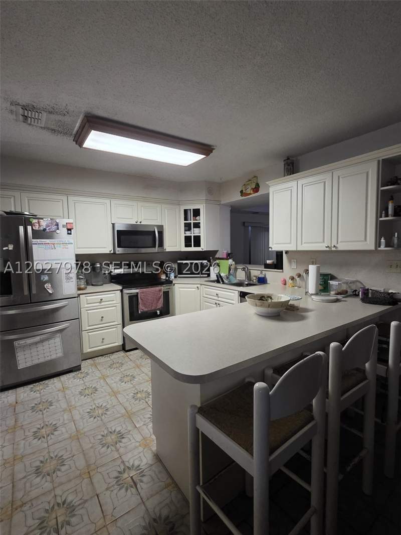 5 bedroom SingleFamilyResidence at 16825 NW 74th Ave, Palm Springs North Sec U, Hialeah — photo 3