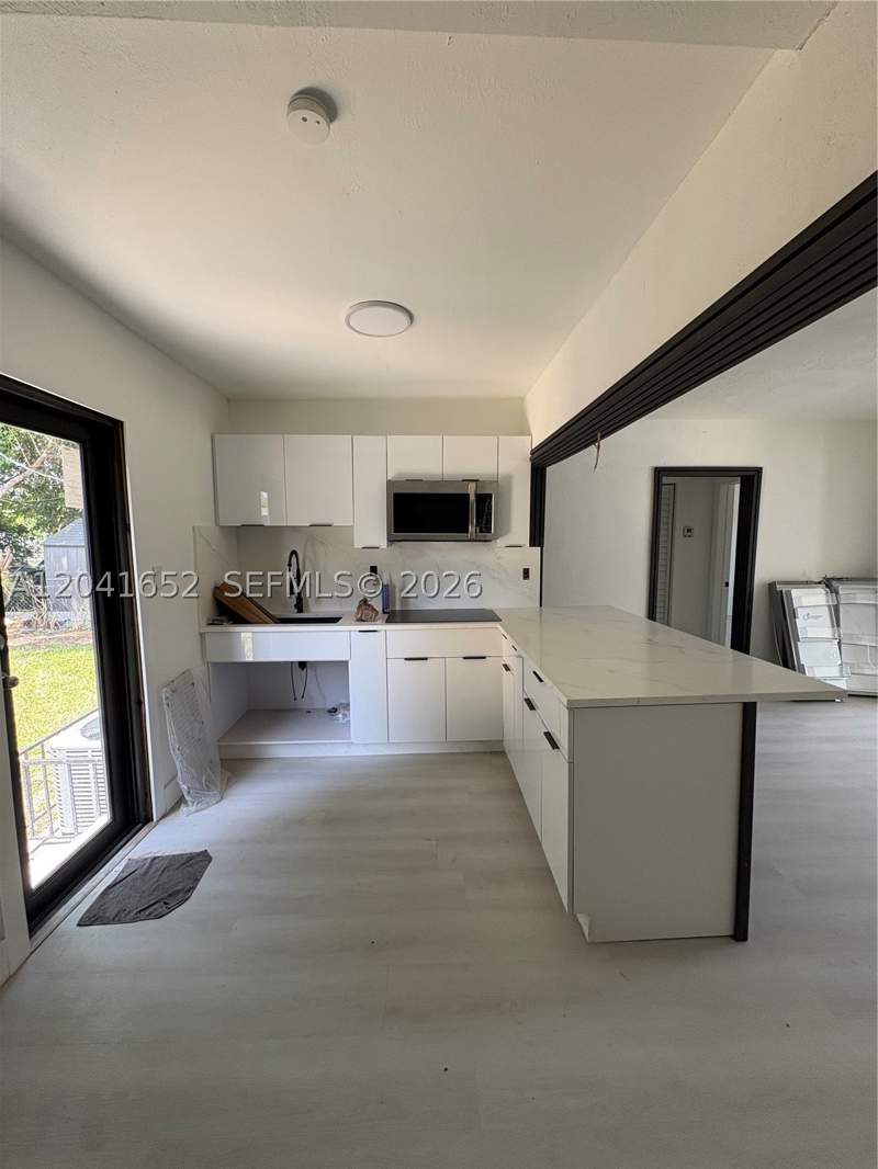 3 bedroom SingleFamilyResidence at 811 NW 65th St, Seventh Ave Park, Miami — photo 5