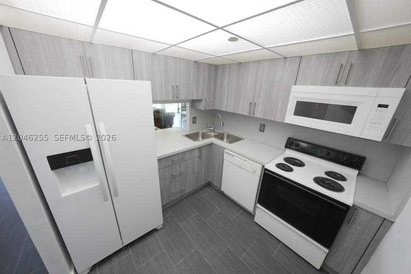 1 bedroom Condominium at 1470 NE 123rd St A104, GREENWICH PH I CONDO, North Miami — photo 1