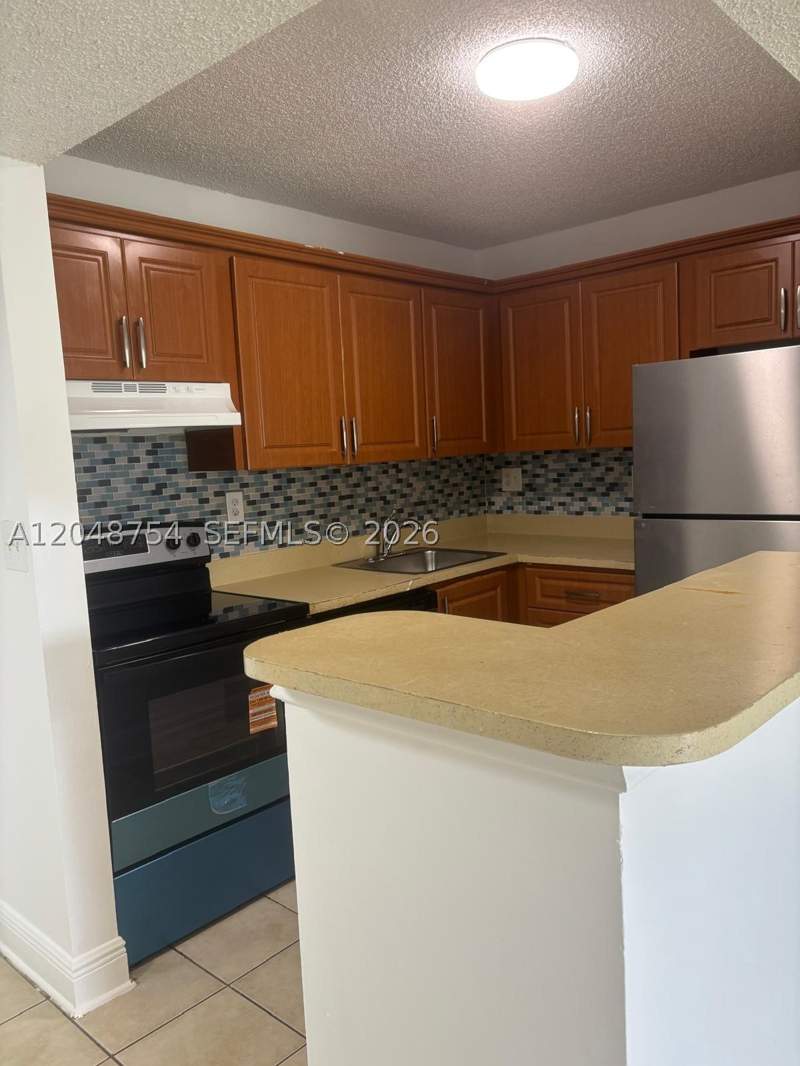 1 bedroom Condominium at 7110 NW 179th St 211, Villa Bellini Condo, Hialeah — photo 2