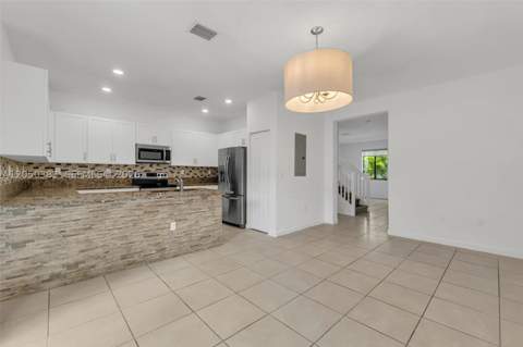 582 NE 207th St, Miami FL - photo 11 of 30