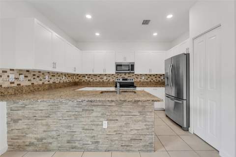 582 NE 207th St, Miami FL - photo 12 of 30