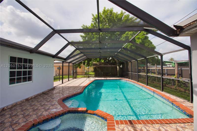 4 bedroom SingleFamilyResidence at 19522 NW 37th Ct, Carol City 2nd Addn, Miami Gardens — photo 2