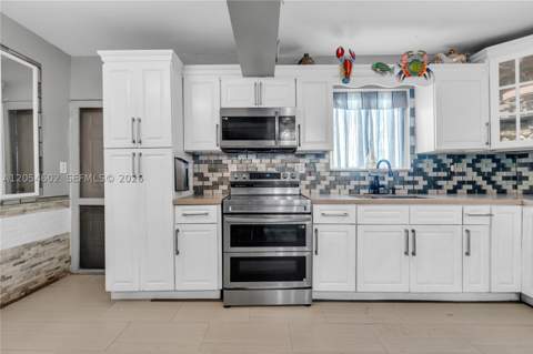 295 NW 122nd St, North Miami FL - photo 10 of 28