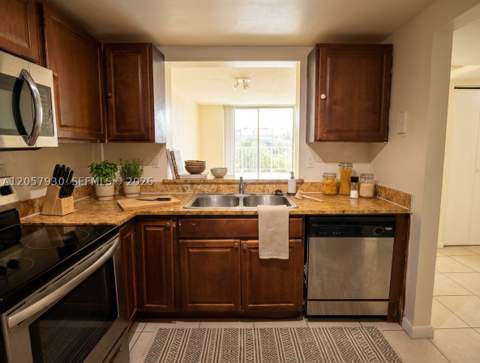 496 NW 165th St Rd D-409, Miami FL - photo 7 of 24