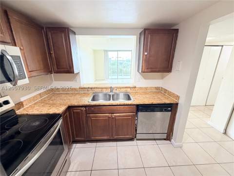 496 NW 165th St Rd D-409, Miami FL - photo 8 of 24