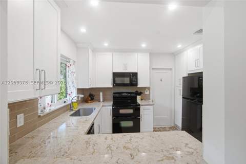 1010 NE 105th St, Miami Shores FL - photo 6 of 48