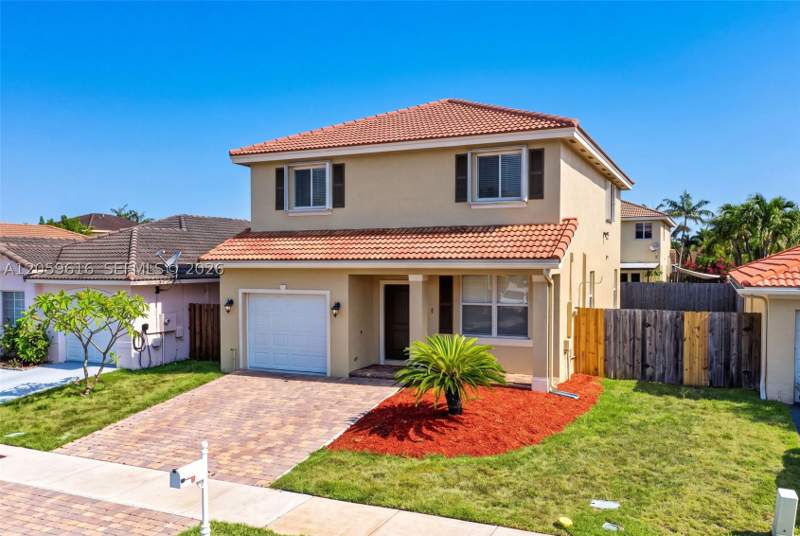 4 bedroom SingleFamilyResidence at 8961 SW 215th Ter, Precious Homes At Lakes B, Cutler Bay — photo 2