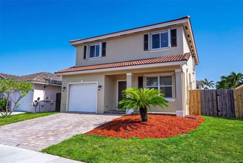 4 bedroom SingleFamilyResidence at 8961 SW 215th Ter, Precious Homes At Lakes B, Cutler Bay — photo 4