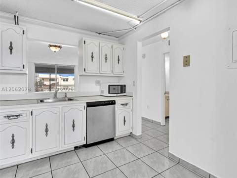 3849 NE 169th St 405, North Miami Beach FL - photo 9 of 52