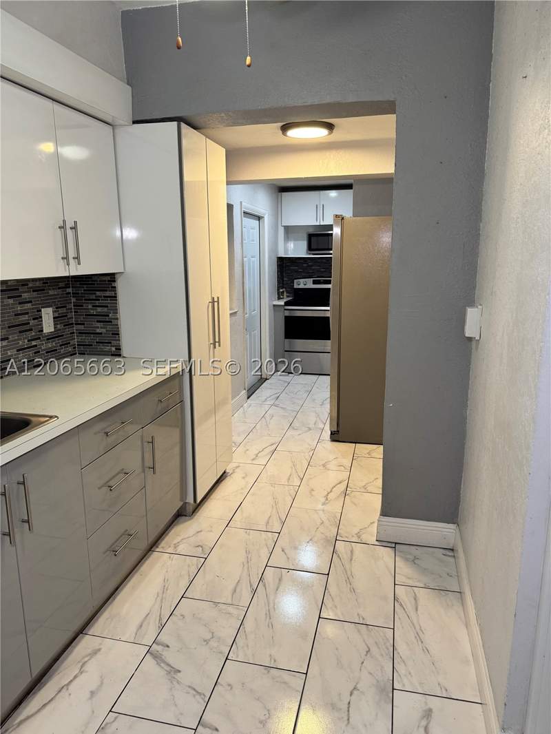 3 bedroom SingleFamilyResidence at 350 NW 58th Ave, W Flagler Pk, Miami — photo 4