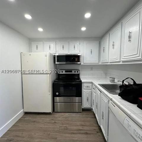 492 NW 165th St Rd C-415, Miami FL - photo 6 of 12