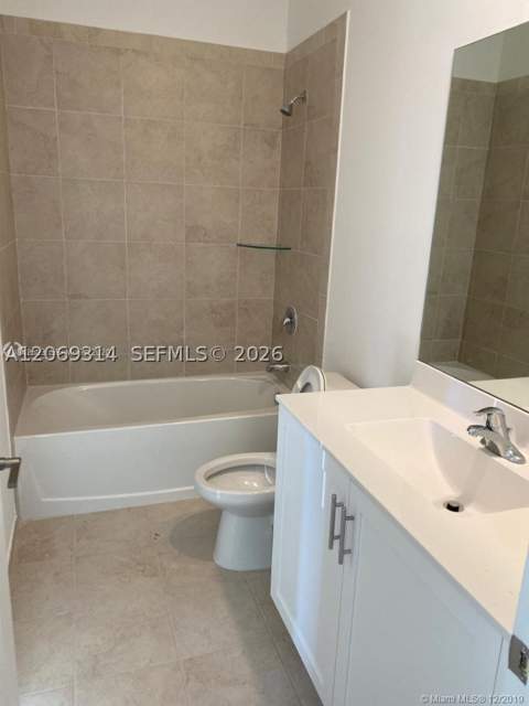 388 NE 208th Ter, Miami FL - photo 13 of 34