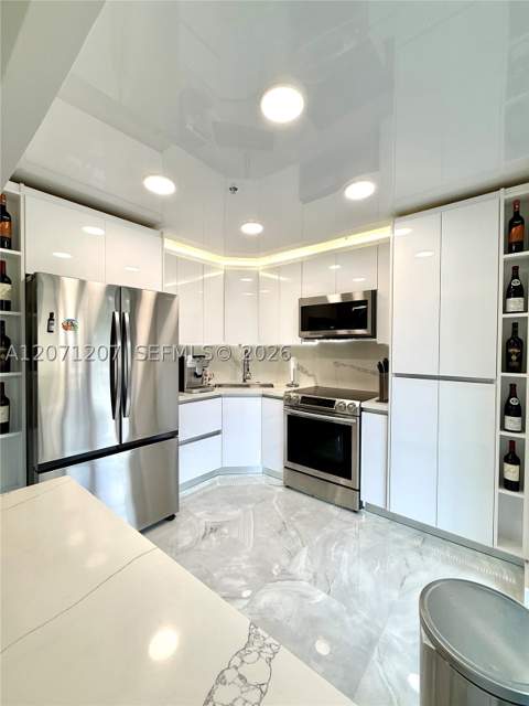 671 NE 195th St 205E, Miami FL - photo 6 of 39