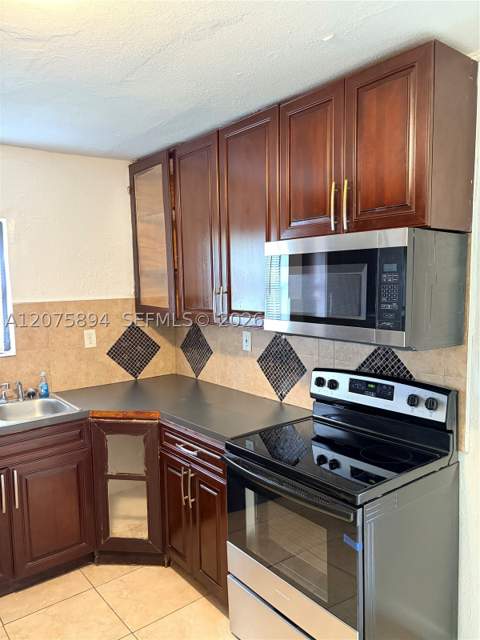 1927 NW 64th St, Miami FL - photo 6 of 16