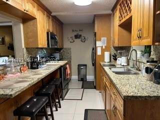 4 bedroom SingleFamilyResidence at 17201 NW 54th Ct, Carol City Red Road Manor, Miami Gardens — photo 5