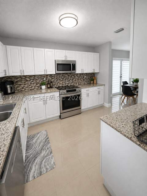 525 NW 23rd Ave, Miami FL - photo 7 of 40