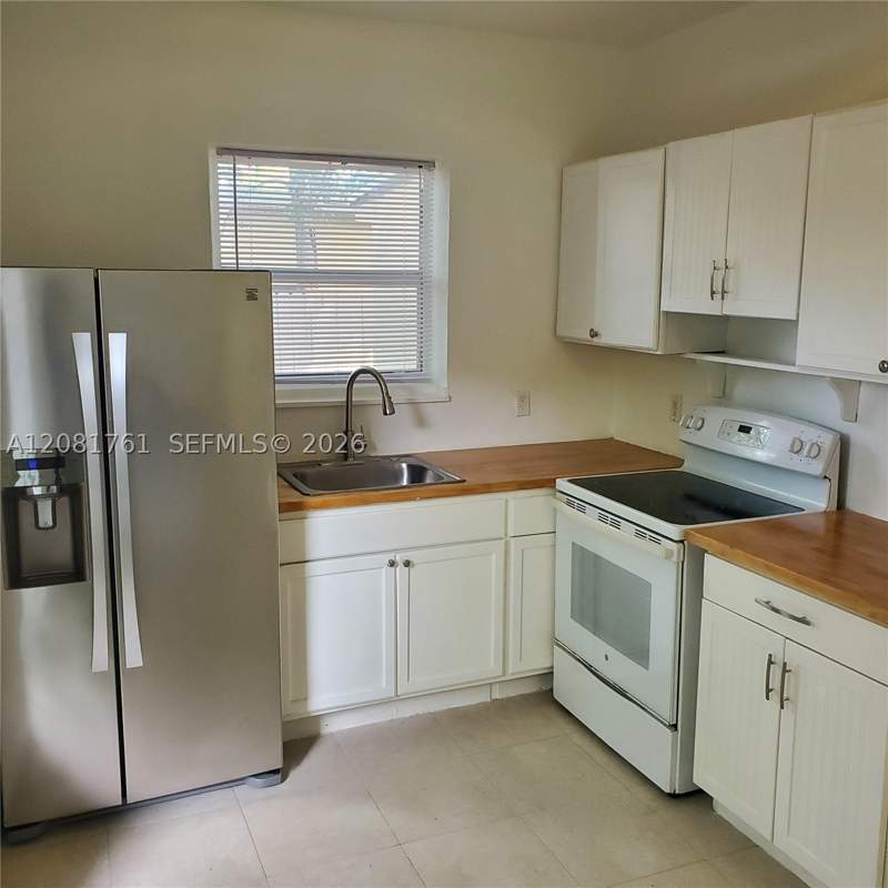 5 bedroom SingleFamilyResidence at 225 NW 59th St, College Park Addn, Miami — photo 5