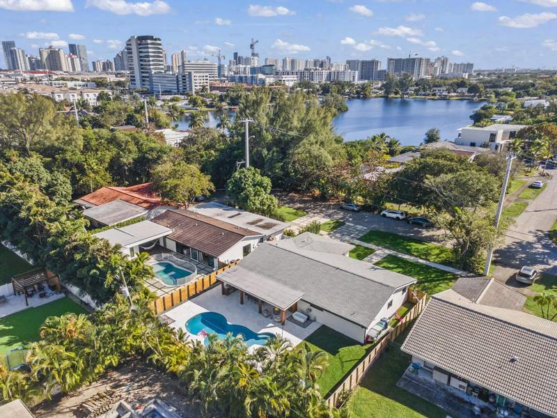 5 bedroom SingleFamilyResidence at 2451 NE 199th Street, County Squire Estates Sec, Miami — photo 2