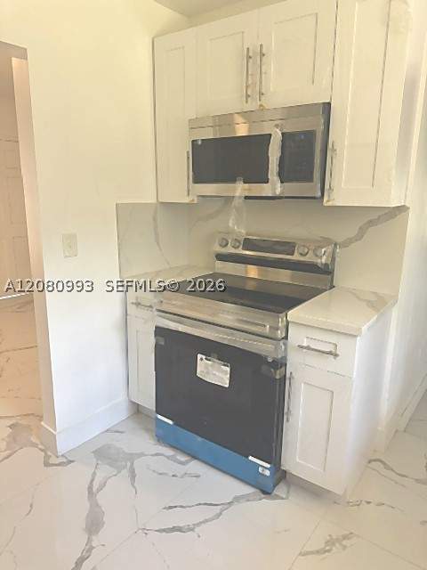 3 bedroom SingleFamilyResidence at 156 NW 88th St, Homedale, El Portal — photo 2