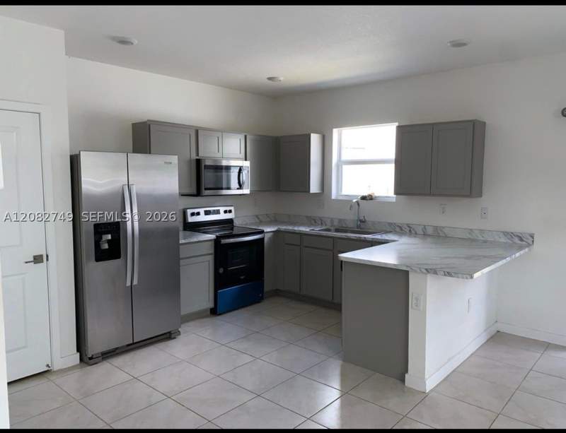 4 bedroom Townhouse at 1816 SE 9th Ave, Hamilton Place, Homestead — photo 2