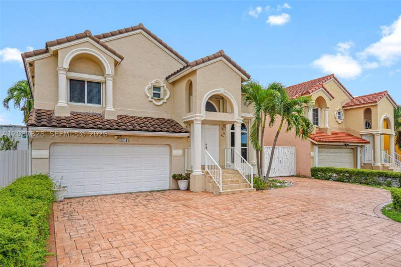 4 bedroom SingleFamilyResidence at 12415 NW 7th Street, Lake Pointe Sec 2, Miami — photo 2